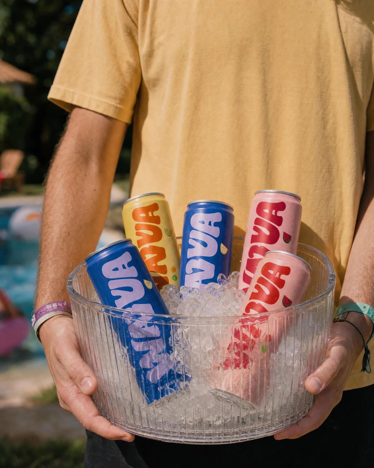 Mixed Wavva cans cooling naturally in an ice bucket at a gathering
